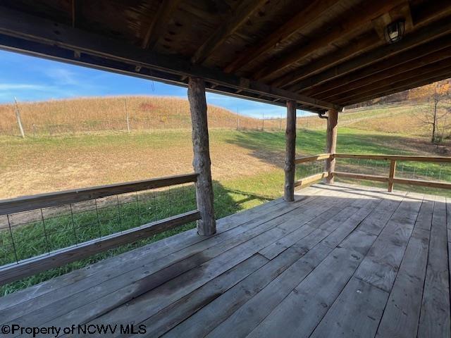 12275 Route 20 S Road, Rock Cave, WV 26234 - wooden terrace featuring a view of countryside and a lawn