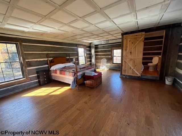 12275 Route 20 S Road, Rock Cave, WV 26234 - bedroom featuring wood finished floors and wood walls