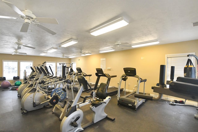 gym with a textured ceiling