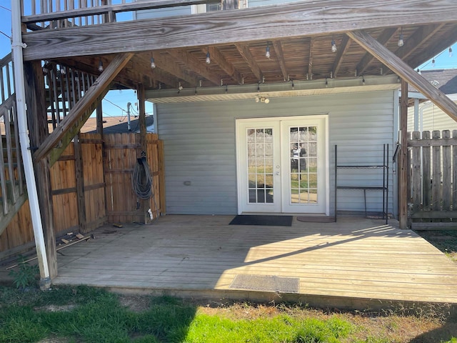 wooden deck featuring french doors