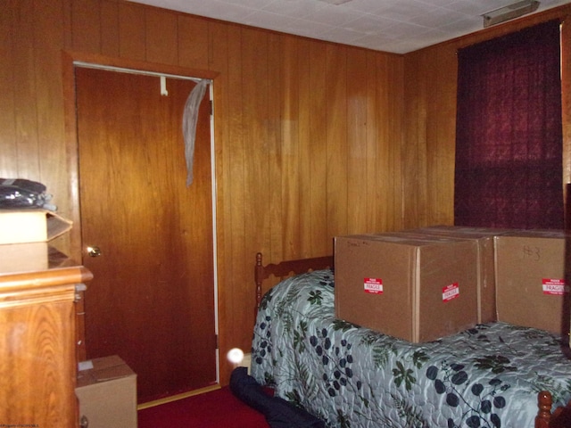 193 E Main St, Salem, WV 26426 - bedroom featuring wooden walls and carpet flooring