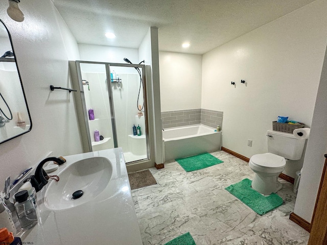 full bathroom featuring toilet, a textured ceiling, independent shower and bath, and vanity