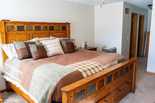 bedroom with light carpet