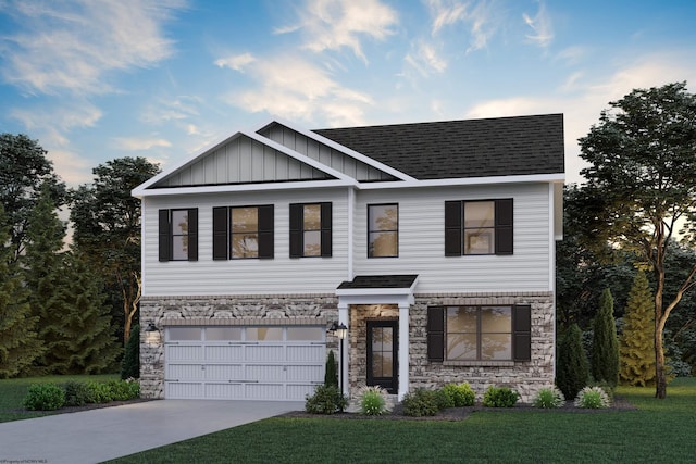 view of front of house with a front lawn and a garage