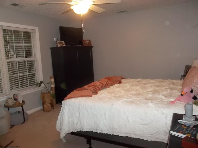 bedroom featuring carpet floors and ceiling fan