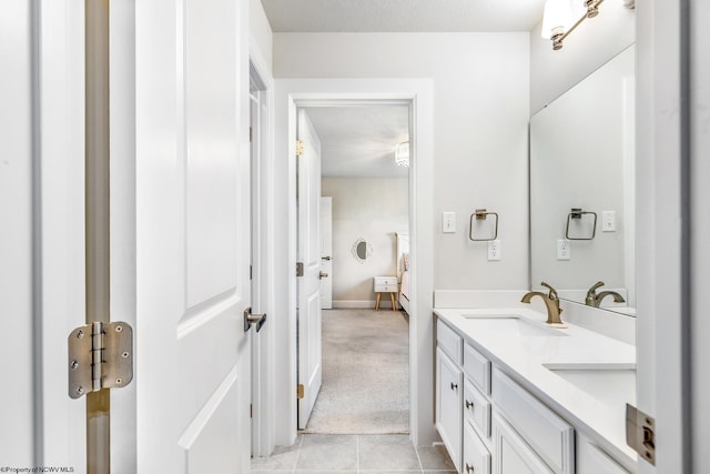 bathroom featuring vanity and tile patterned flooring