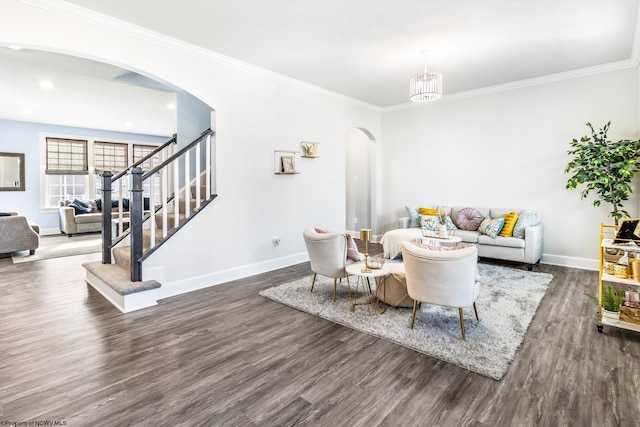 living room with crown molding and dark hardwood / wood-style floors