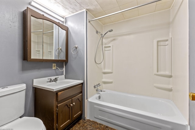 full bathroom with vanity, toilet, and washtub / shower combination