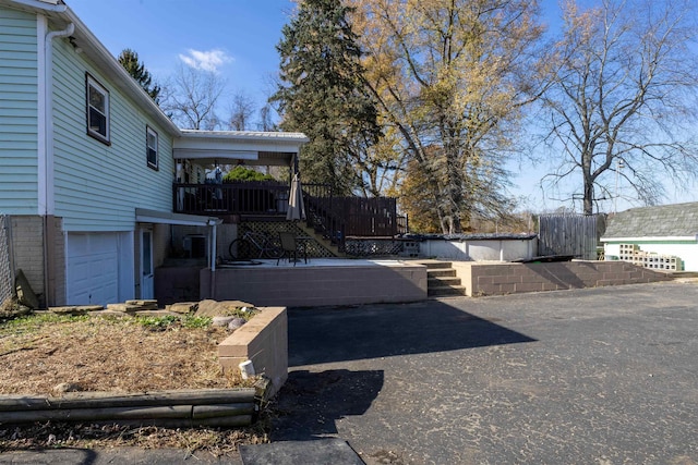 view of yard featuring a garage