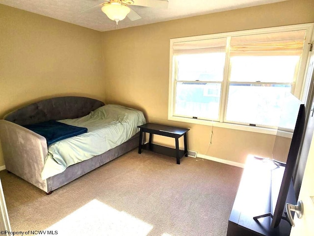 bedroom featuring carpet flooring and ceiling fan