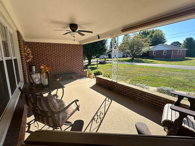 view of patio with ceiling fan