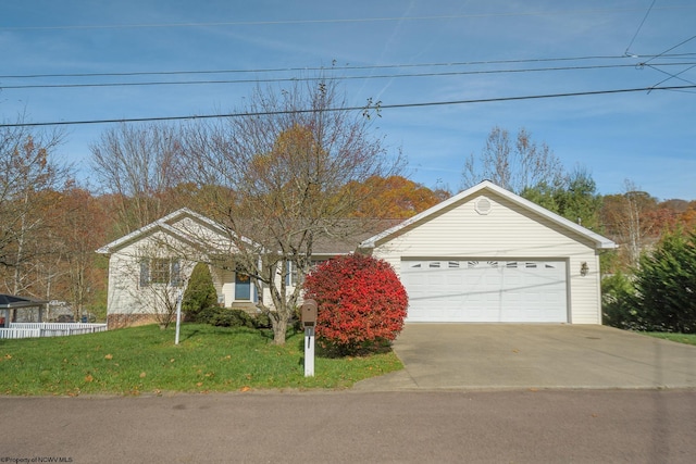 ranch-style house with a front lawn and a garage