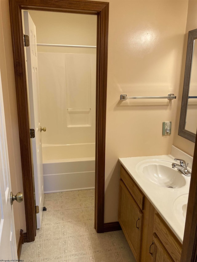 bathroom featuring vanity and shower / bathing tub combination