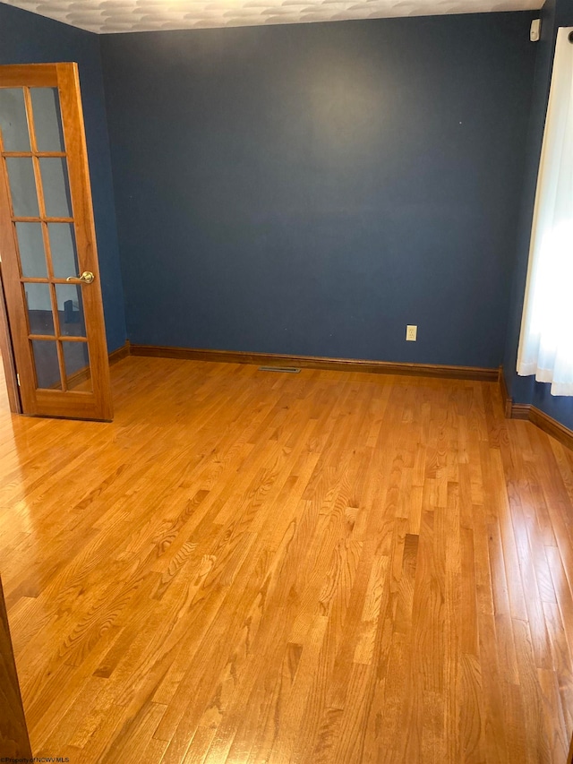 empty room featuring light hardwood / wood-style flooring