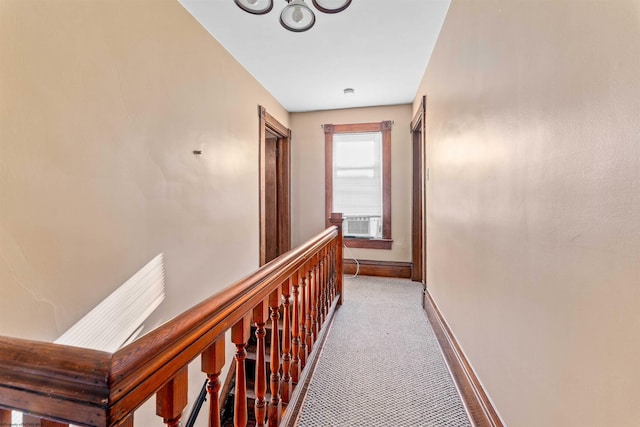 hallway with carpet flooring and cooling unit