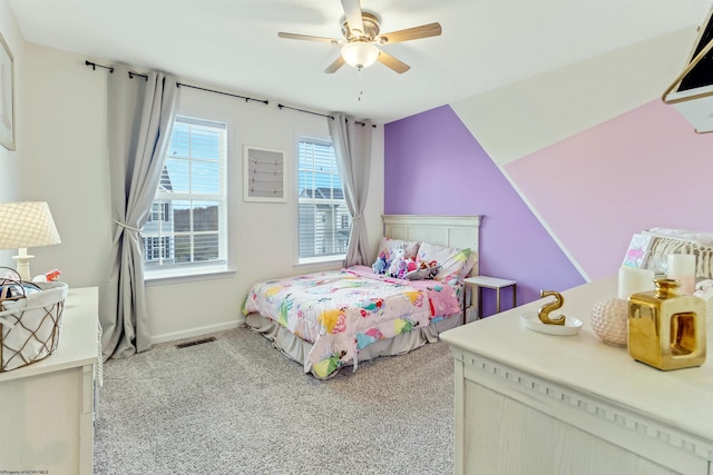 carpeted bedroom with ceiling fan