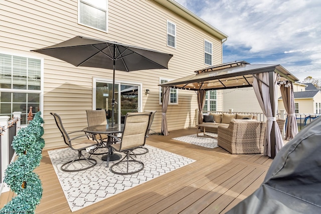 deck with an outdoor hangout area and a gazebo