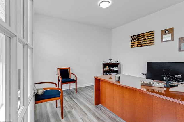 office area with light wood-type flooring