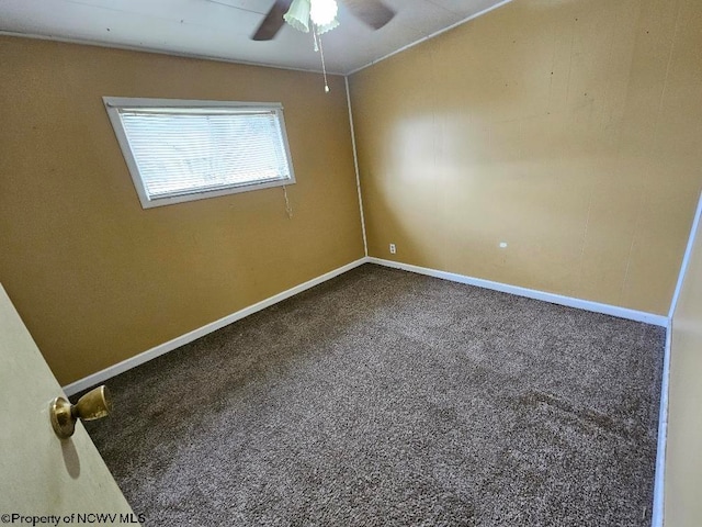 unfurnished room with ceiling fan and carpet floors