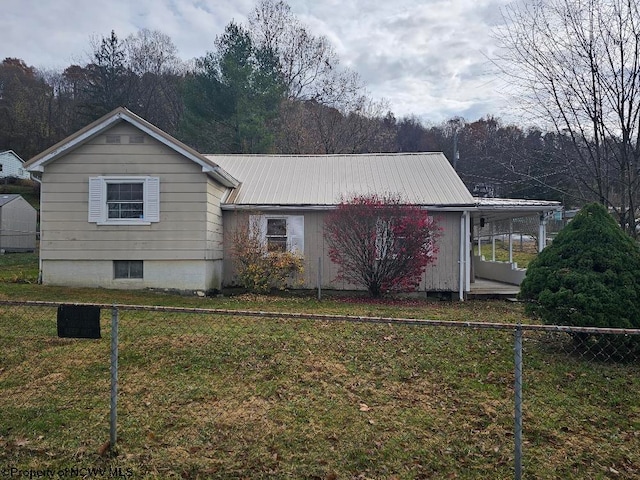 view of home's exterior featuring a yard