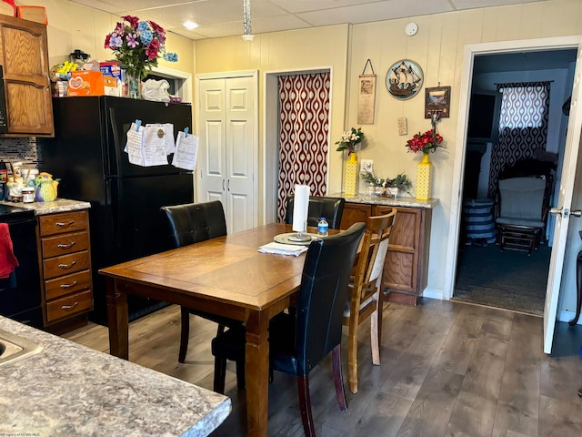 dining room featuring dark hardwood / wood-style floors