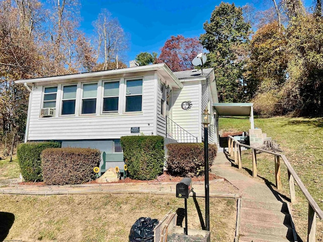 view of front of property with cooling unit