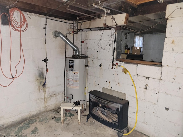 utility room with gas water heater