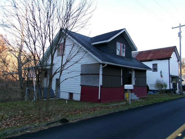 2040 Monumental Rd, Rivesville, WV 26588 - view of property exterior featuring roof with shingles