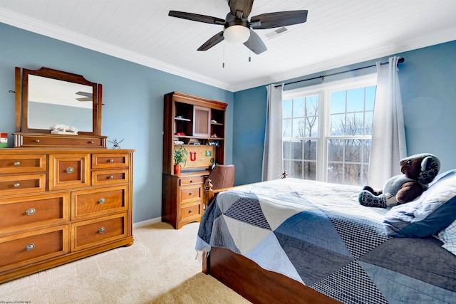 carpeted bedroom with ceiling fan, wood ceiling, and crown molding