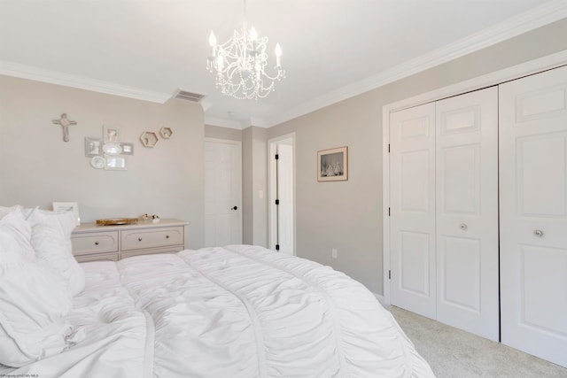 carpeted bedroom featuring ornamental molding, a chandelier, and a closet