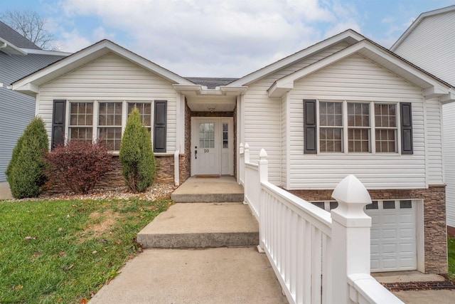 view of front of home with a garage