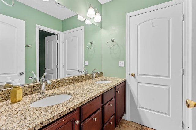 bathroom featuring vanity and tile patterned floors