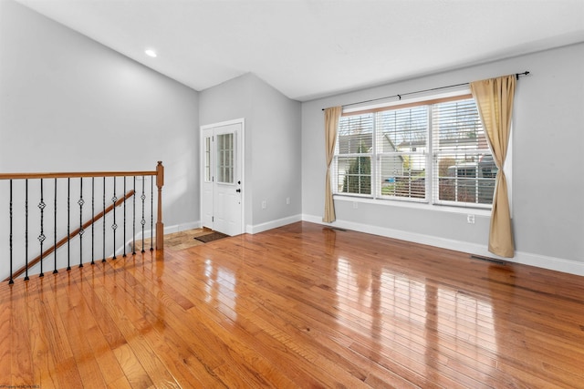 empty room featuring hardwood / wood-style floors