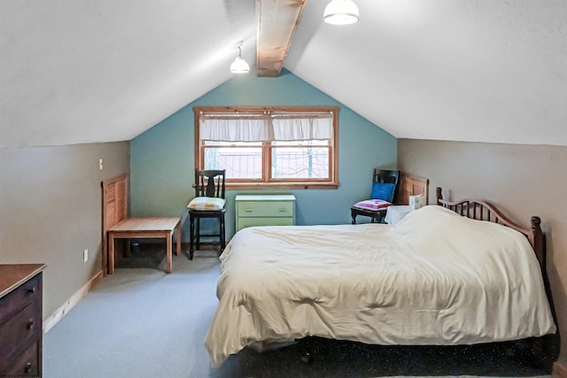 bedroom with vaulted ceiling and light colored carpet