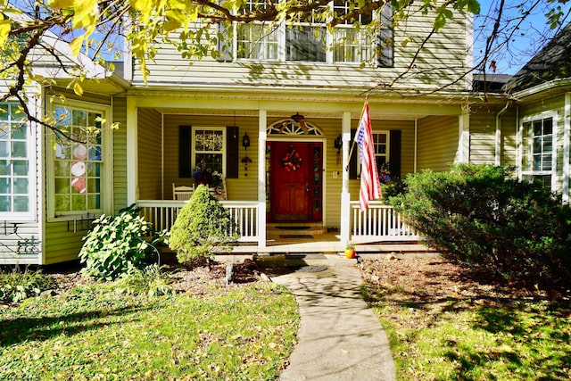 entrance to property with covered porch