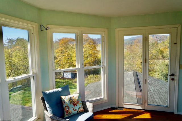 sunroom featuring a healthy amount of sunlight