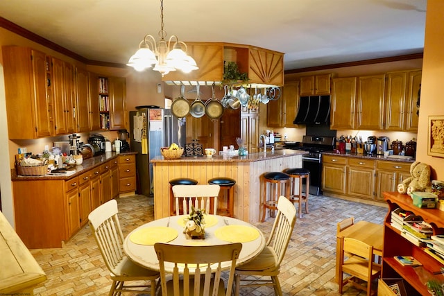 kitchen featuring a kitchen breakfast bar, a kitchen island, range hood, and appliances with stainless steel finishes