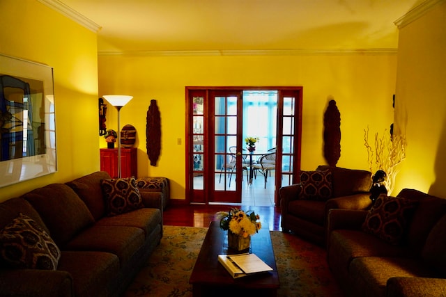 living room featuring french doors, dark hardwood / wood-style floors, and crown molding