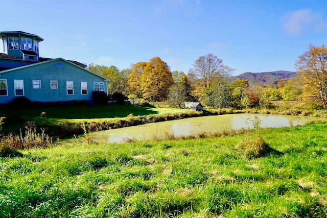 view of yard with a water view