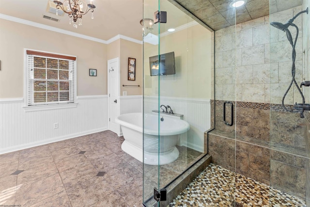 bathroom with ornamental molding, tile patterned flooring, a notable chandelier, and separate shower and tub