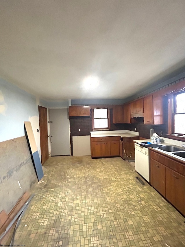 kitchen featuring white dishwasher