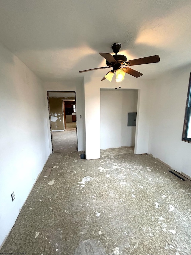 interior space featuring ceiling fan