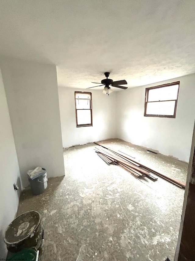 spare room with ceiling fan