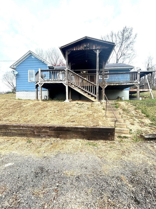 back of property with a deck