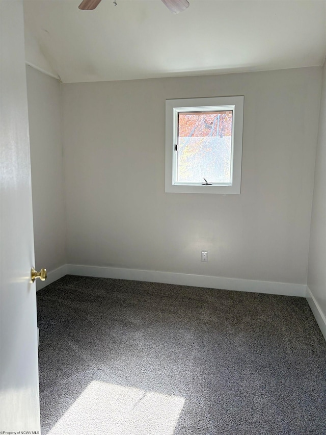 empty room with carpet and ceiling fan