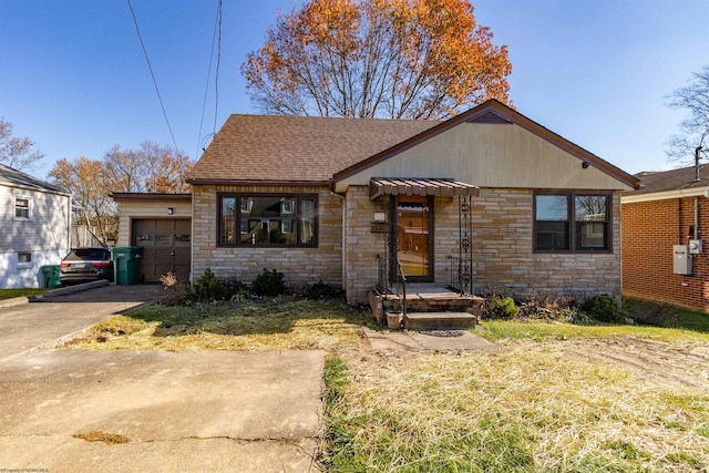 bungalow-style home with a garage