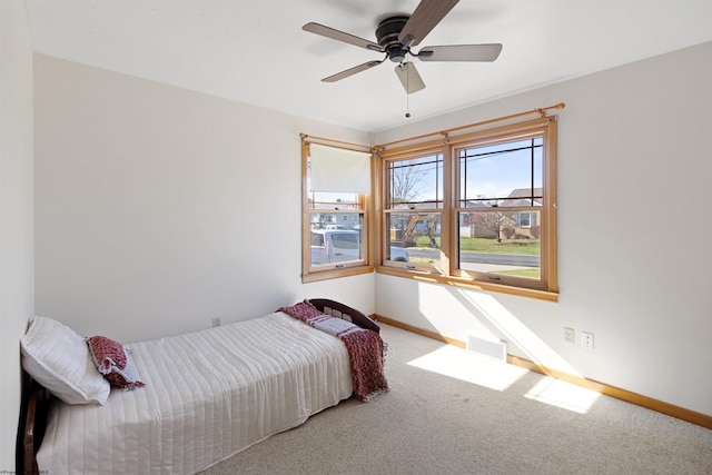 bedroom featuring carpet and ceiling fan