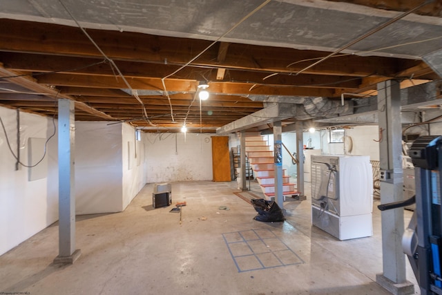 basement with separate washer and dryer