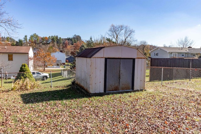 view of outdoor structure with a lawn