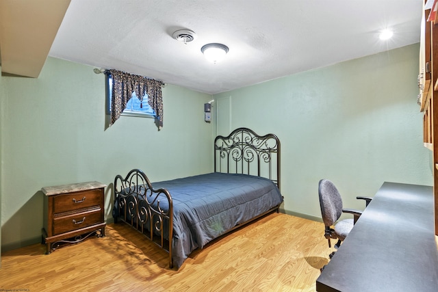 bedroom featuring light wood-type flooring